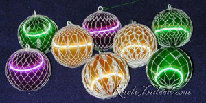 a collection of satin ornament balls covered with netting